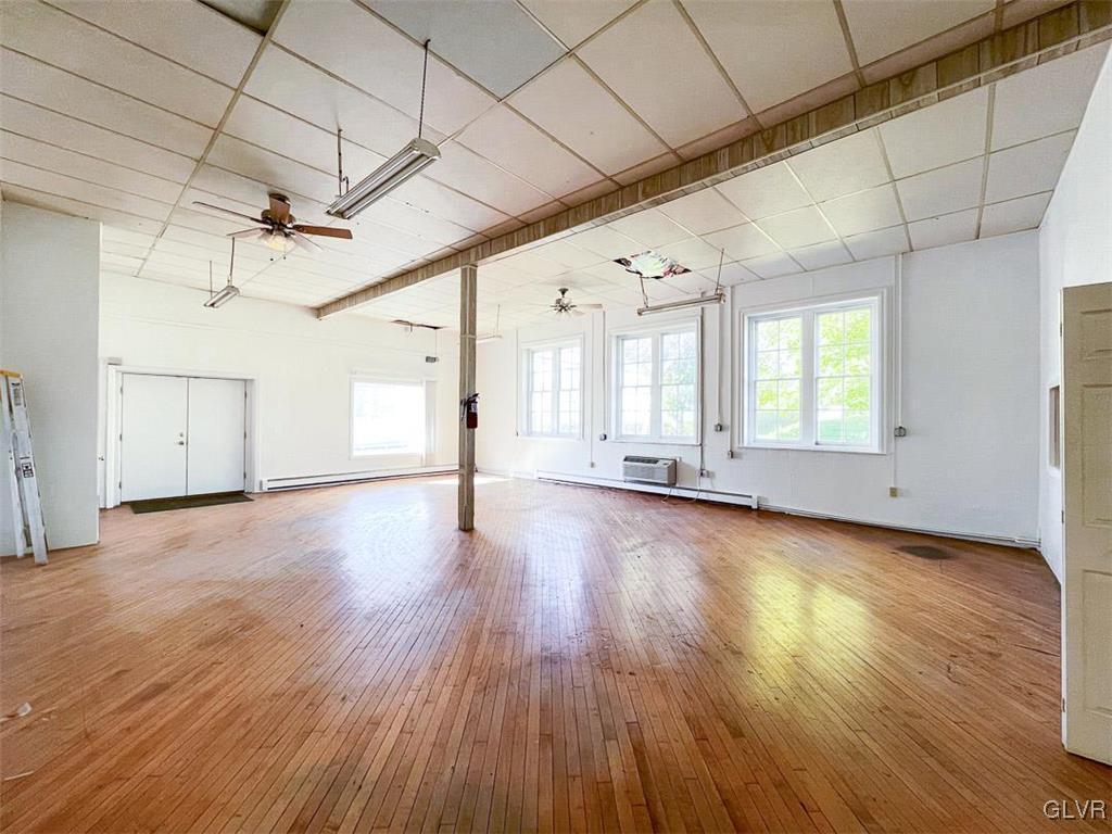 4111 Mauch Chunk Road Coplay, PA 18037 - Photo 19 of 43 a view of a livingroom with wooden floor