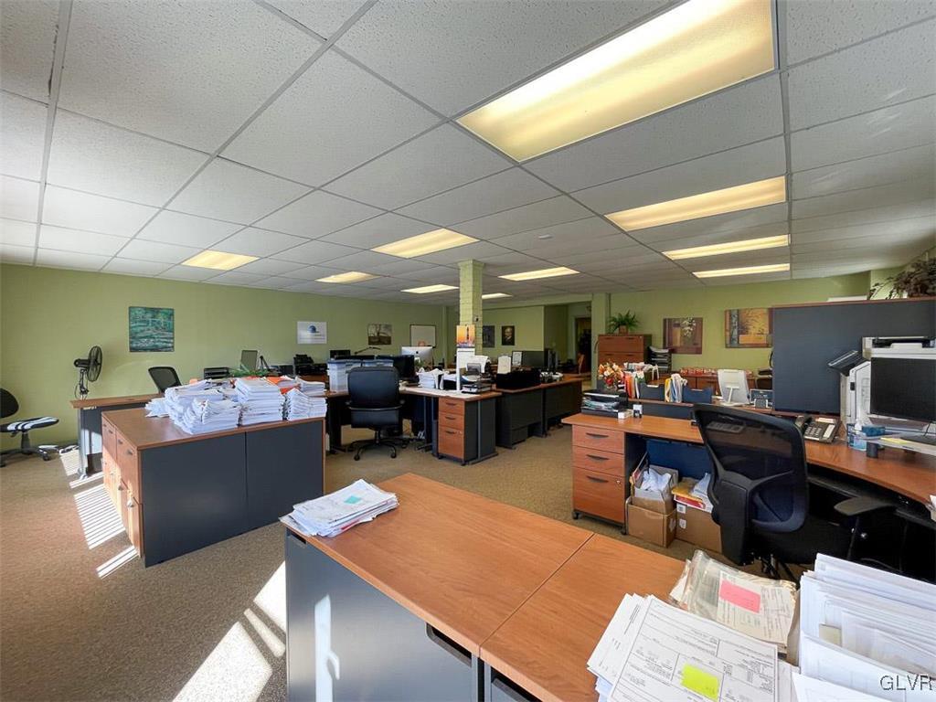 4111 Mauch Chunk Road Coplay, PA 18037 - Photo 21 of 43 a room with lots of furniture and clutter