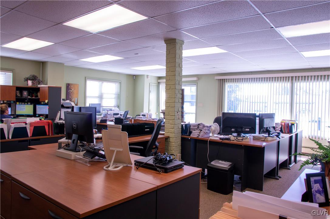 4111 Mauch Chunk Road Coplay, PA 18037 - Photo 24 of 43 a view of a workspace with a window and sitting area