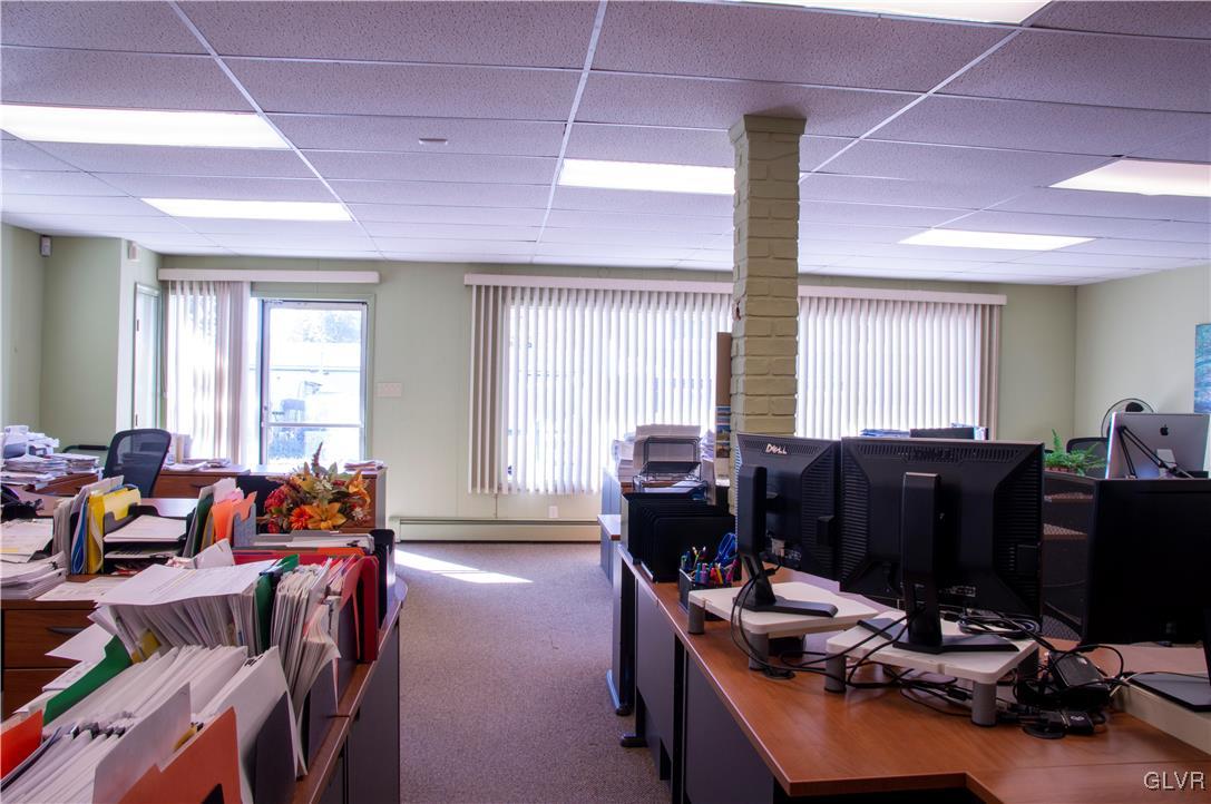 4111 Mauch Chunk Road Coplay, PA 18037 - Photo 25 of 43 a room with furniture and musical instruments