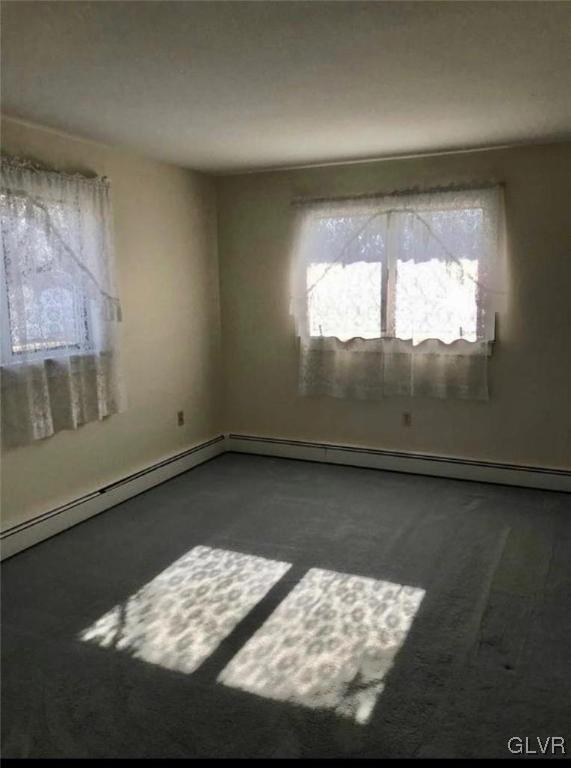 4111 Mauch Chunk Road Coplay, PA 18037 - Photo 34 of 43 a view of a room with wooden floor and a window
