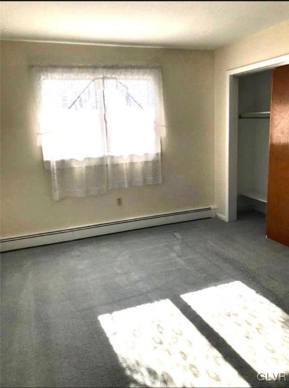 4111 Mauch Chunk Road Coplay, PA 18037 - Photo 42 of 43 an empty room with a window