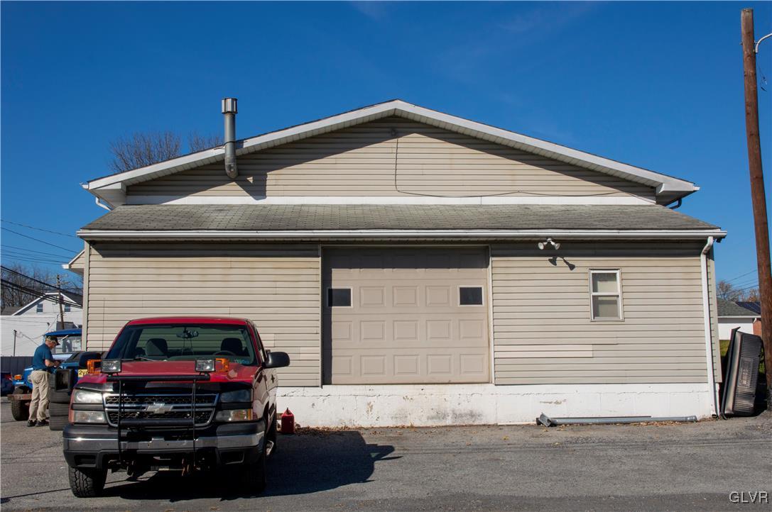 4111 Mauch Chunk Road Coplay, PA 18037 - Photo 5 of 43 a car parked in front of a house