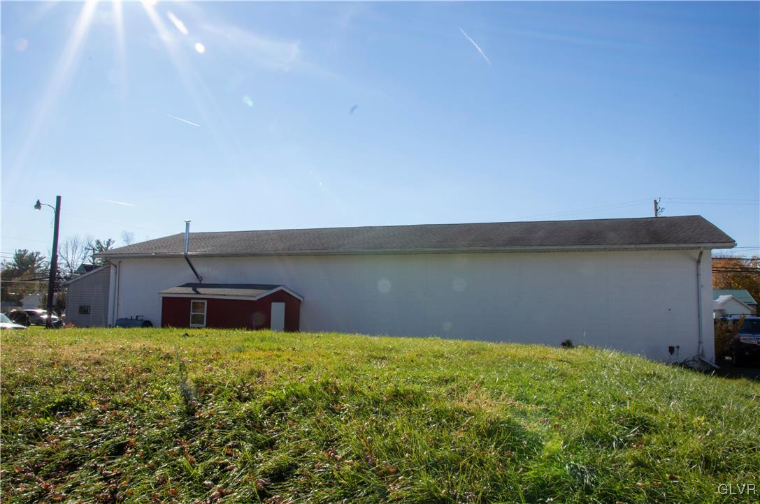 4111 Mauch Chunk Road Coplay, PA 18037 - Photo 10 of 43 a house view with a garden space
