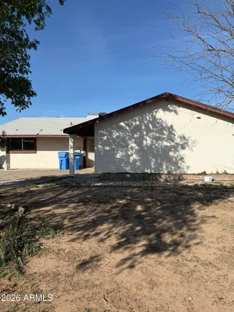 a view of a back yard of the house