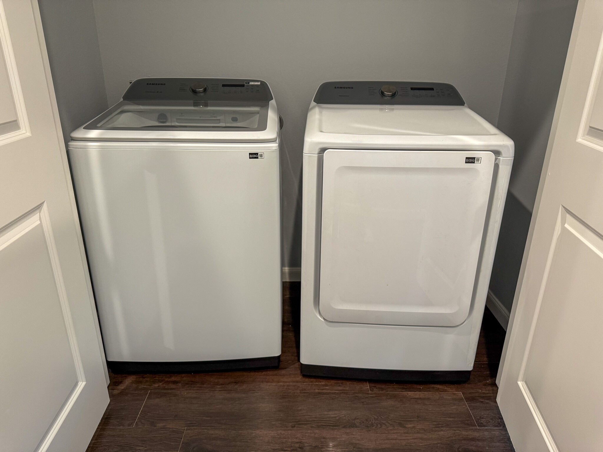 4939 Ambient Dr Spring Spring, TX 77379 - Photo 9 of 18 a utility room with dryer and washer
