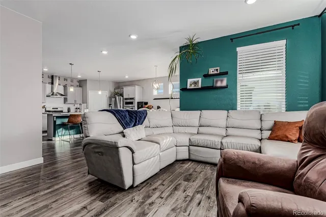 a spacious bedroom with a bed and a window