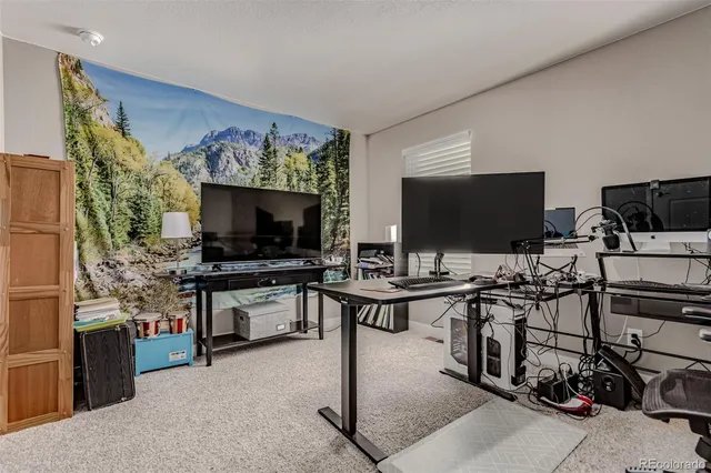 a view of a chair and table in the balcony