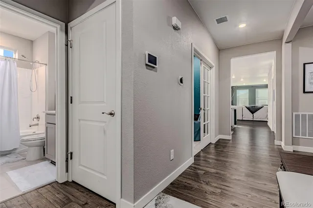 a view of a dining room with furniture and window
