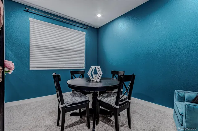 a kitchen with a sink appliances and cabinets