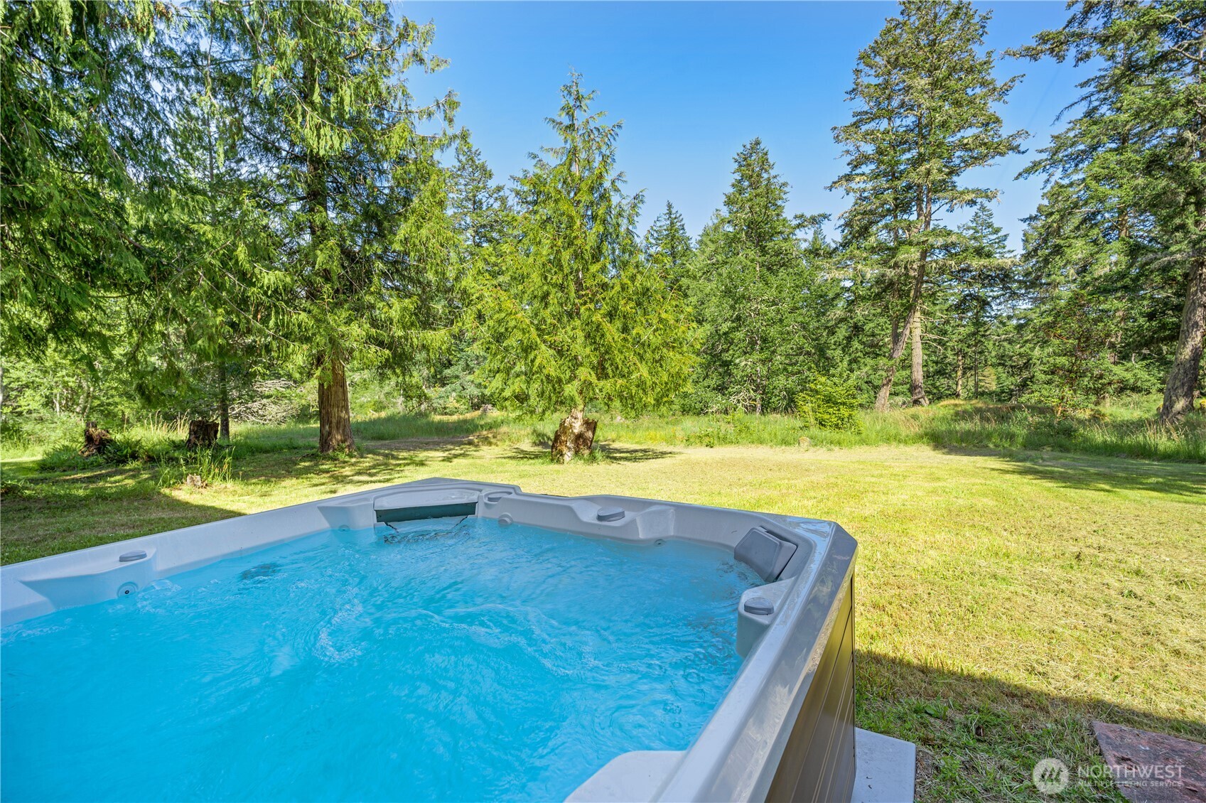 134 Sacred Moon Way Friday Harbor, WA 98250 - Photo 27 of 35 a view of swimming pool with an outdoor space and seating area