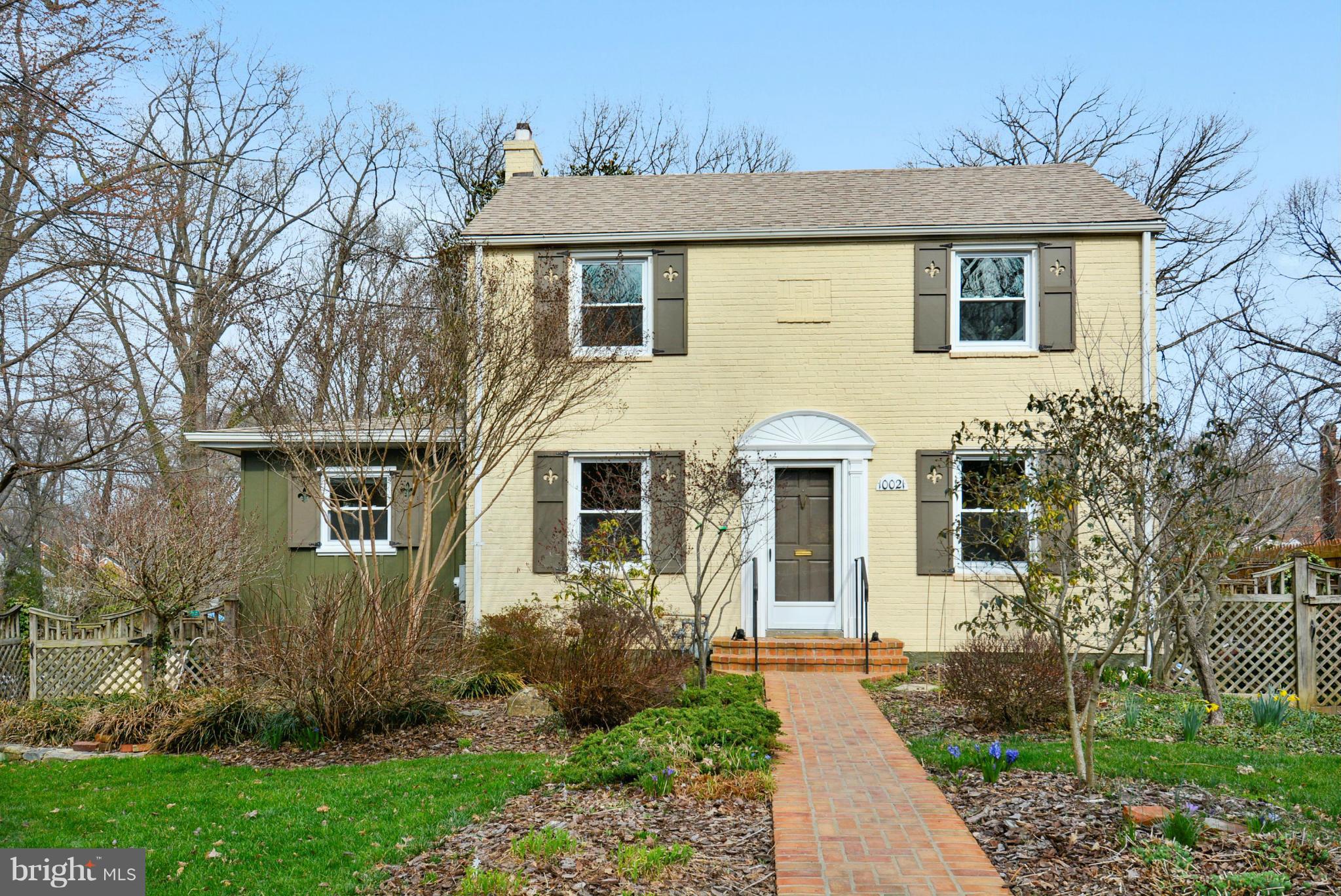 10021 Raynor Road Silver Spring, MD 20901 - Photo 1 of 30 a front view of a house with garden