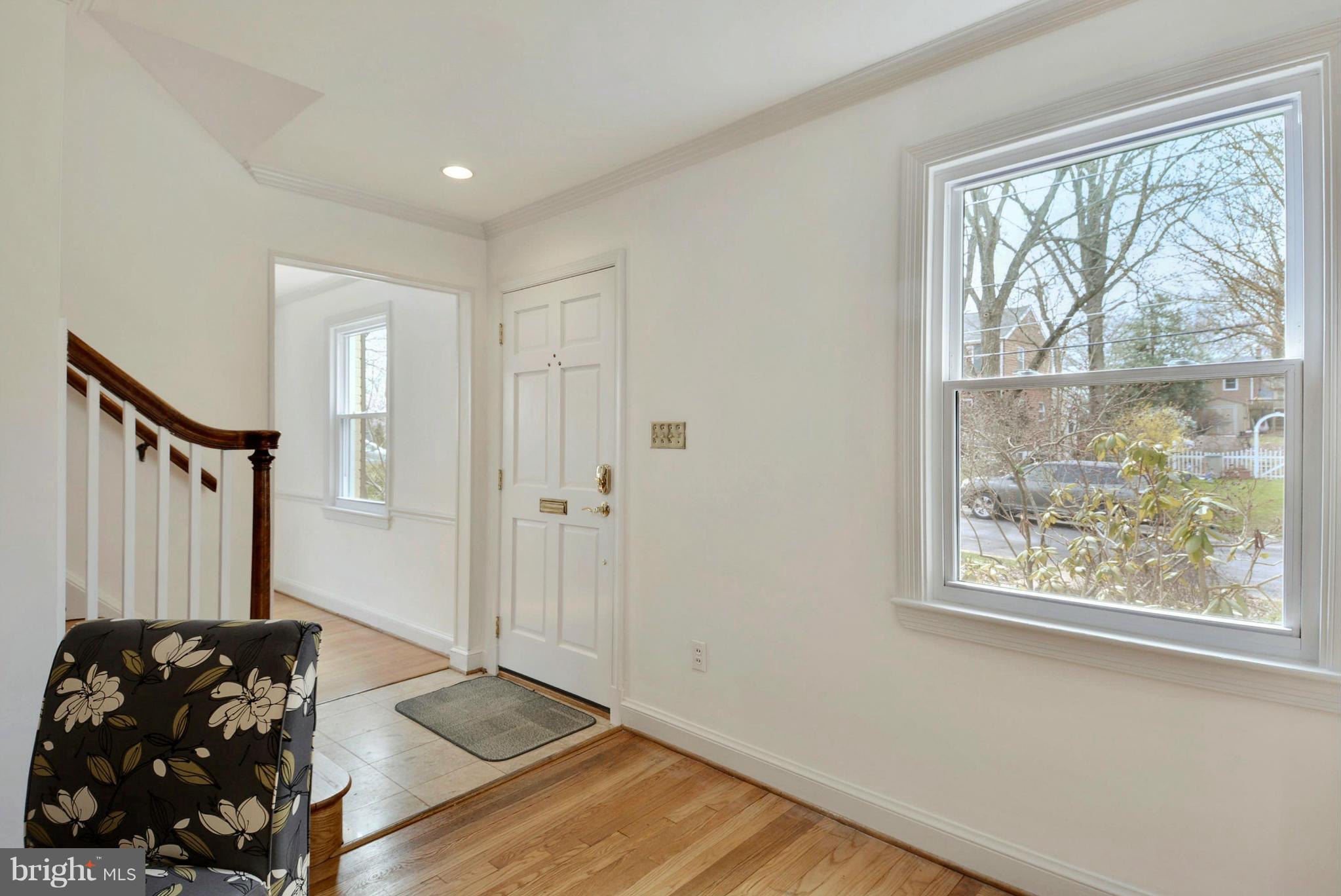 10021 Raynor Road Silver Spring, MD 20901 - Photo 2 of 30 a view of a livingroom with wooden floor and a large window