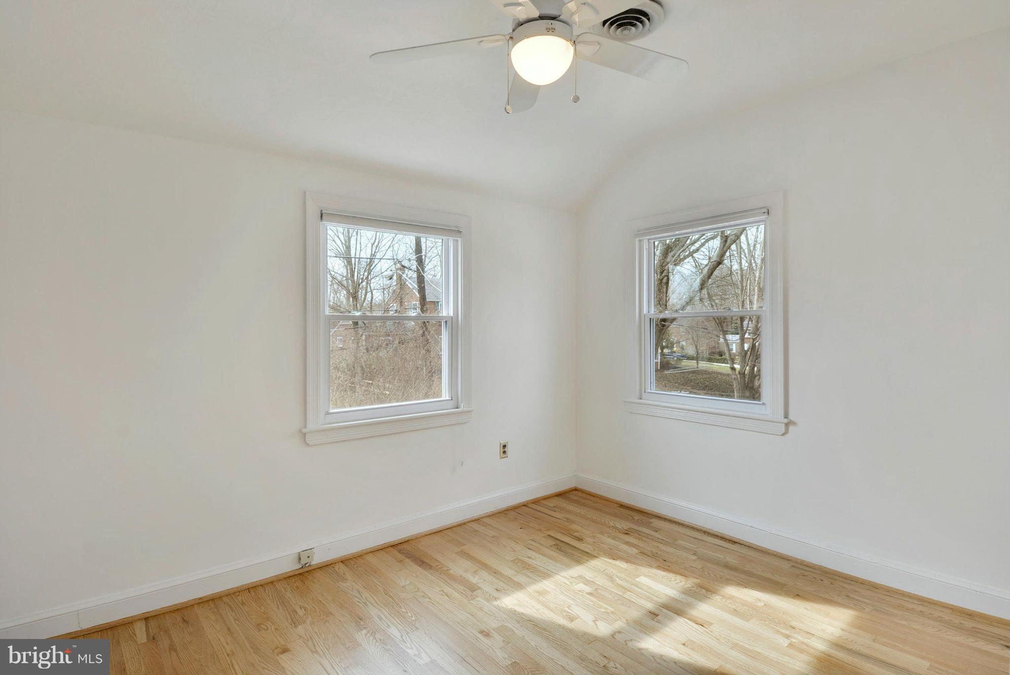 10021 Raynor Road Silver Spring, MD 20901 - Photo 18 of 30 an empty room with windows