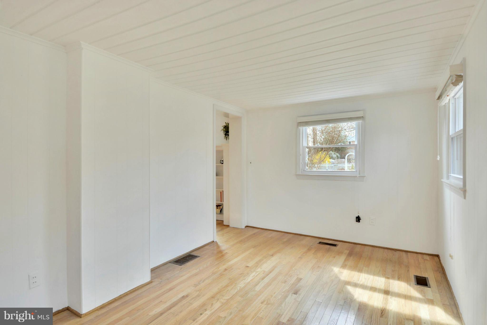 10021 Raynor Road Silver Spring, MD 20901 - Photo 25 of 30 a view of empty room with wooden floor