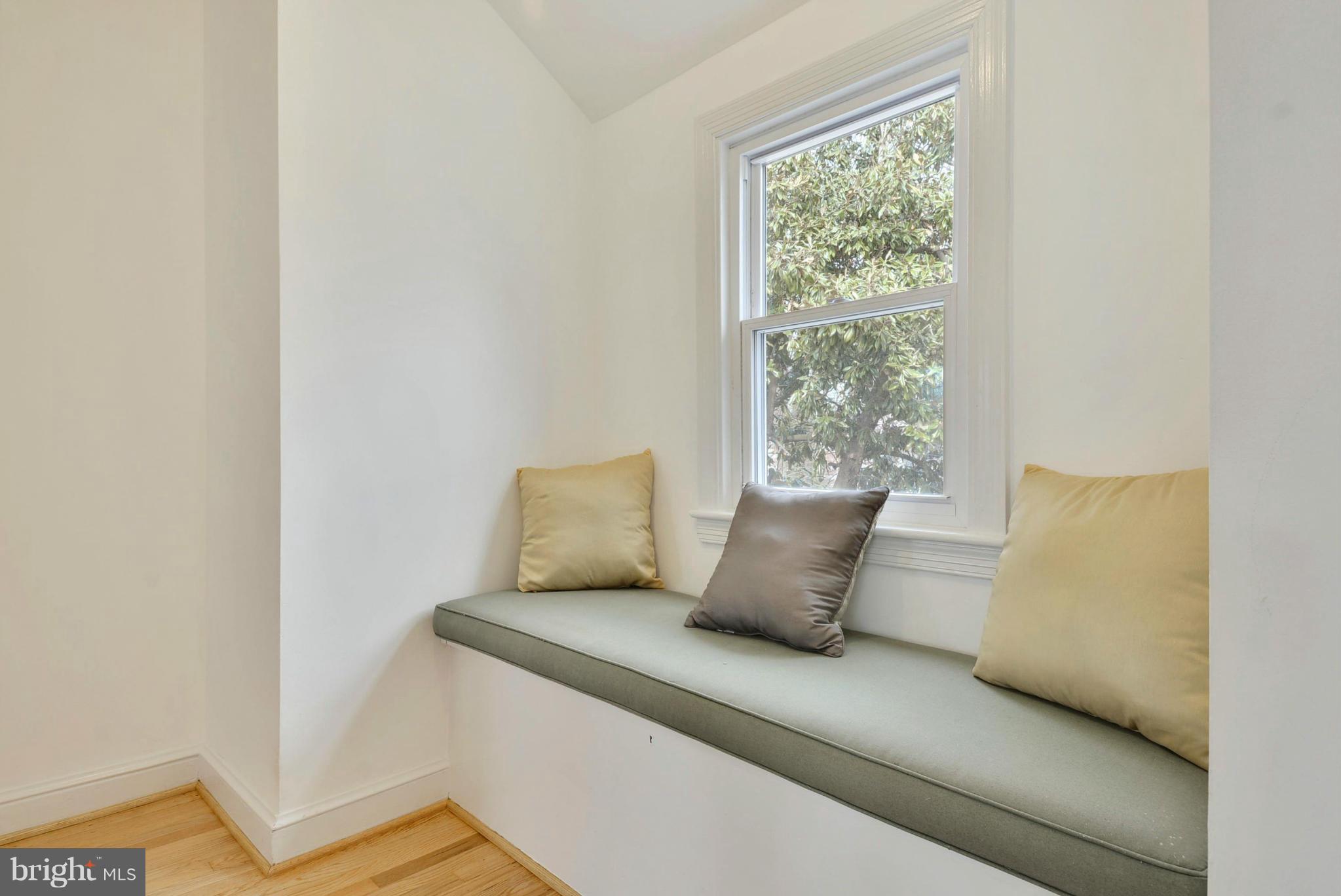 10021 Raynor Road Silver Spring, MD 20901 - Photo 27 of 30 a bed sitting in a bedroom next to a window