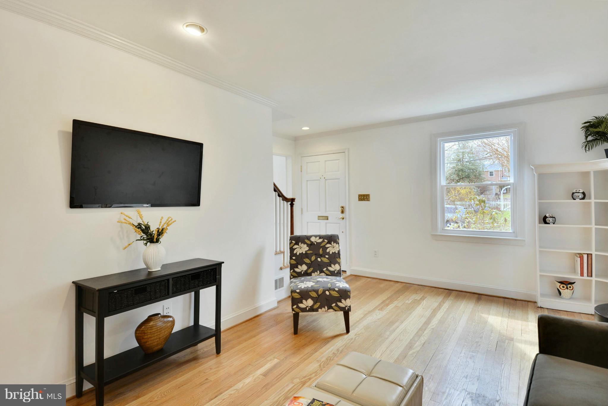 10021 Raynor Road Silver Spring, MD 20901 - Photo 6 of 30 a living room with furniture and a flat screen tv