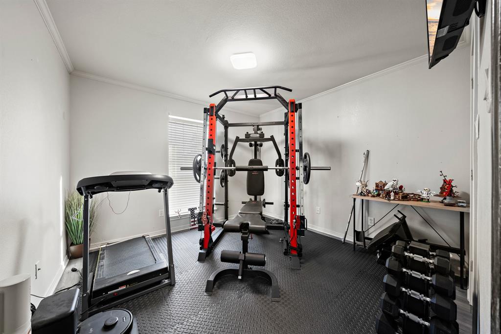 10512 Whitney Trace Drive Waco, TX 76708 - Photo 17 of 36 a view of a room with gym equipment