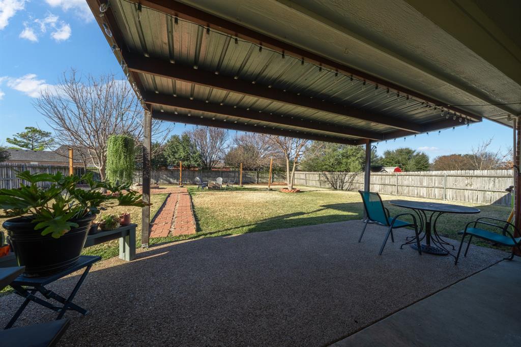 10512 Whitney Trace Drive Waco, TX 76708 - Photo 30 of 36 a view of swimming pool with outdoor seating and plants