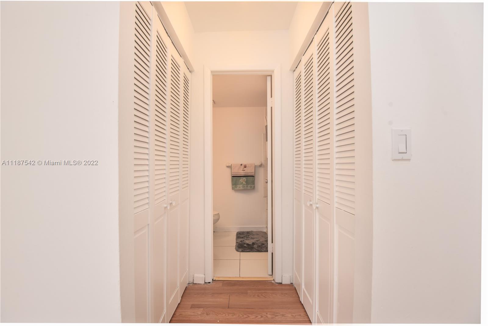 3199 Foxcroft Road, Unit 304 Miramar, FL 33025 - Photo 21 of 35 a view of a bathroom from a hallway