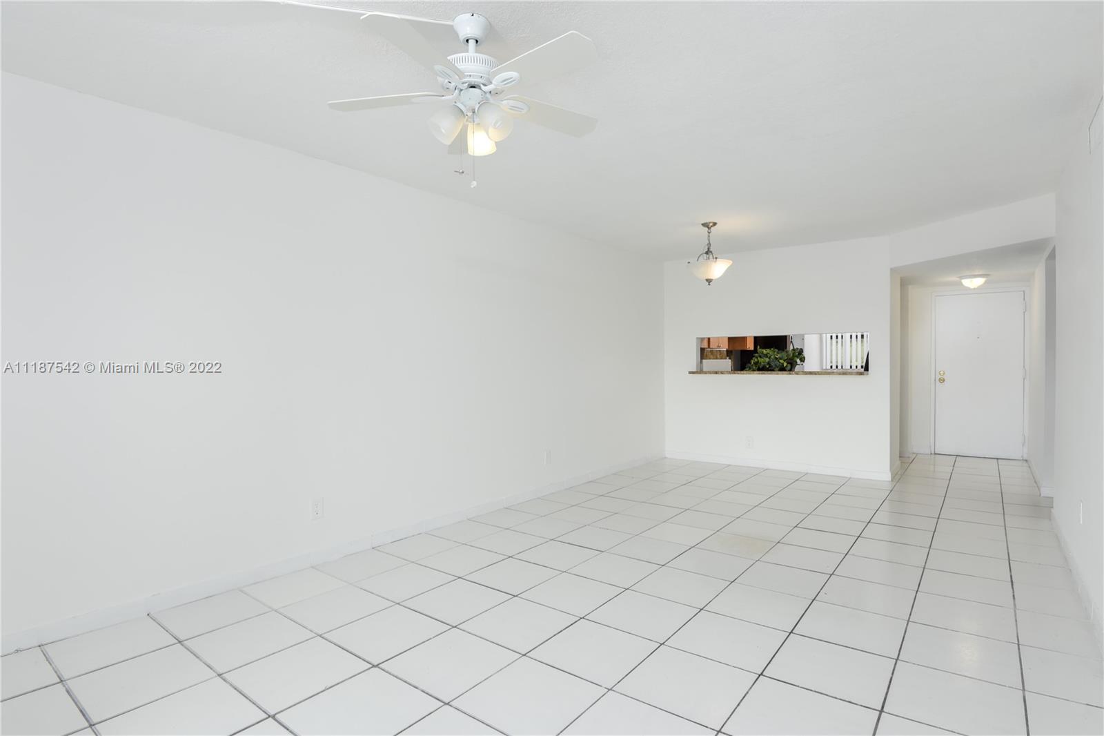 3199 Foxcroft Road, Unit 304 Miramar, FL 33025 - Photo 5 of 35 a view of a kitchen with a sink