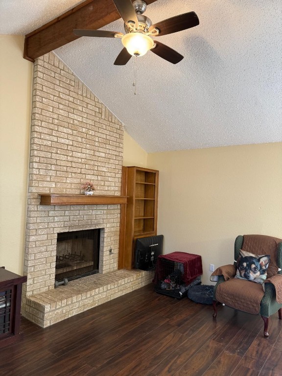 16023 Stoneham Circle Pflugerville, TX 78660 - Photo 5 of 13 a living room with furniture and a fireplace