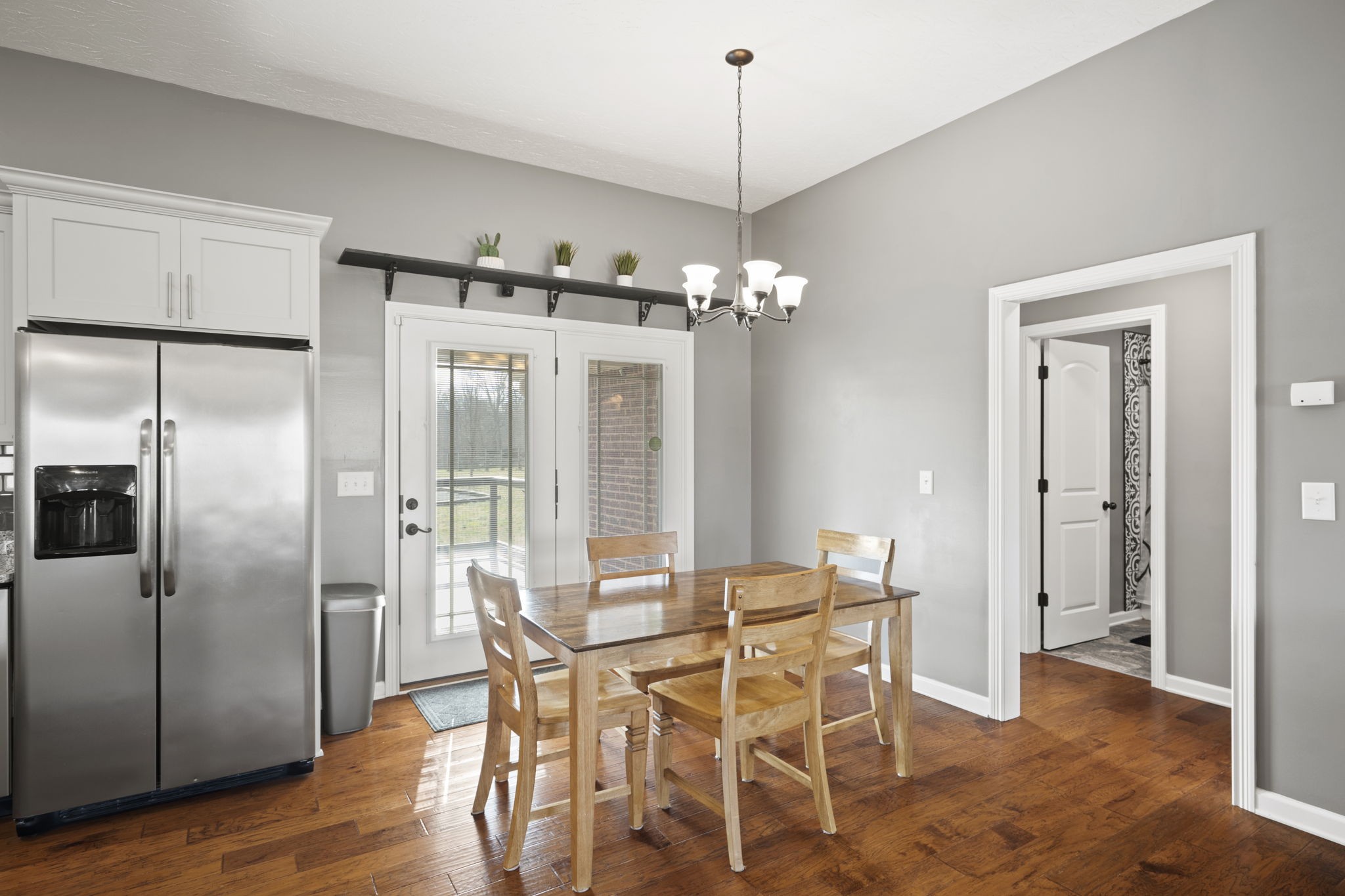 8930 New Chapel Road Springfield, TN 37172 - Photo 12 of 57 a view of a dining room with furniture window and wooden floor