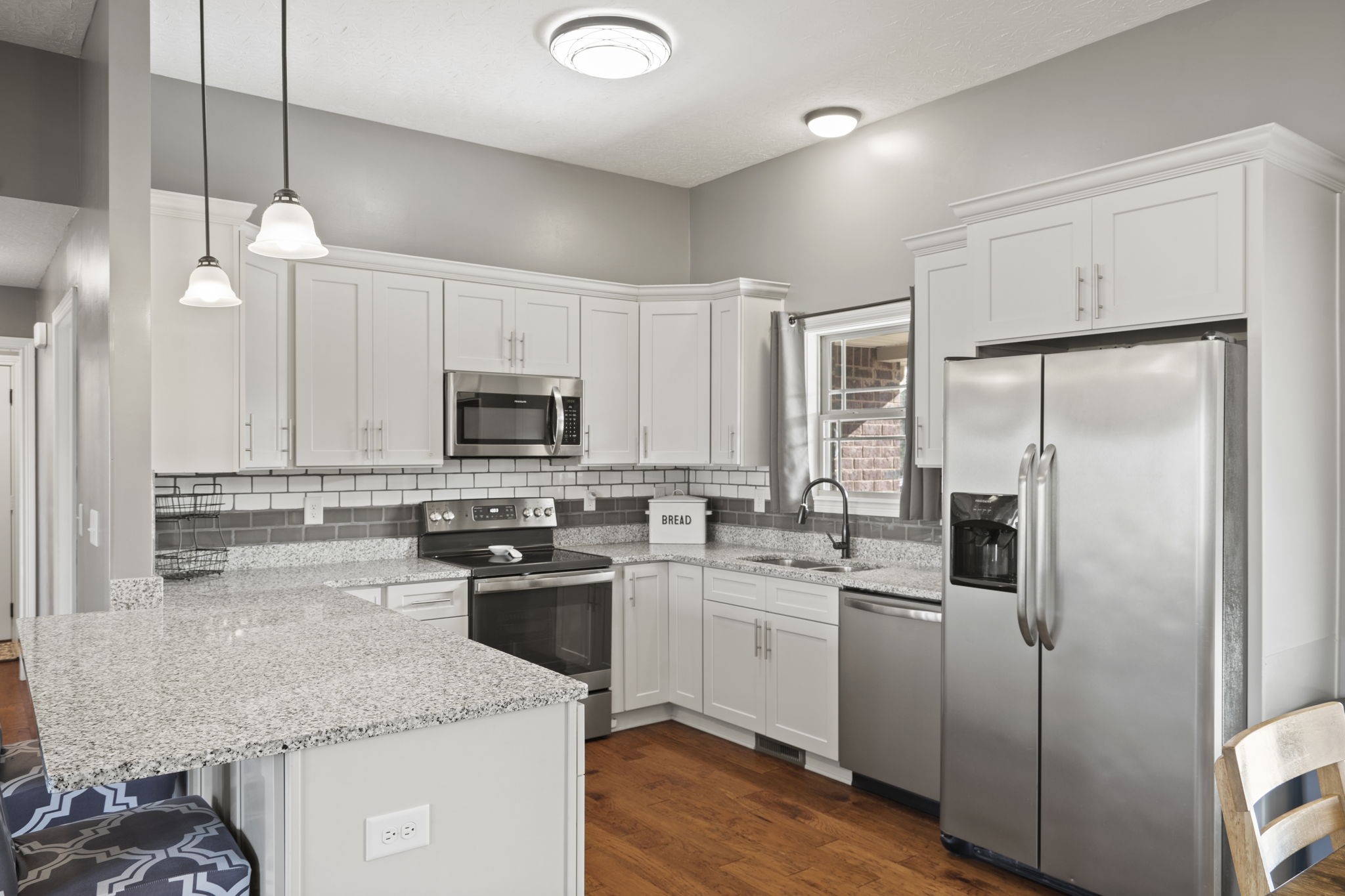 8930 New Chapel Road Springfield, TN 37172 - Photo 13 of 57 a kitchen with a sink stainless steel appliances and white cabinets