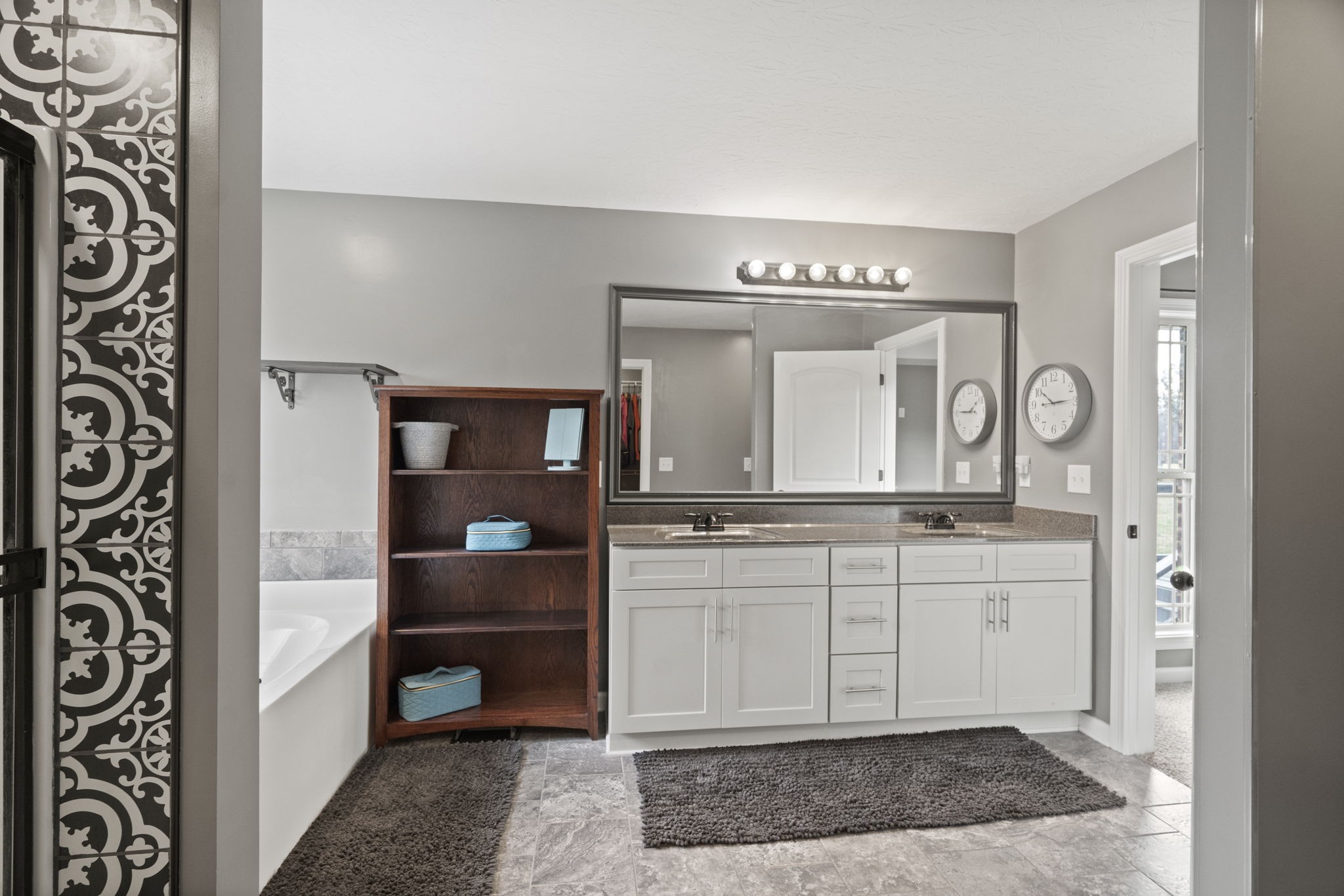 8930 New Chapel Road Springfield, TN 37172 - Photo 23 of 57 a spacious bathroom with a double vanity sink and a mirror