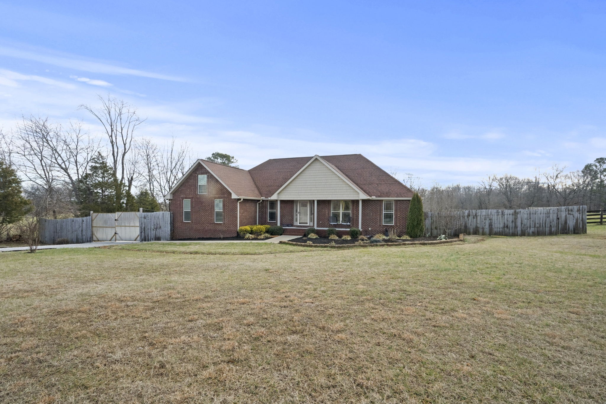 8930 New Chapel Road Springfield, TN 37172 - Photo 4 of 57 a front view of a house with a yard and garage