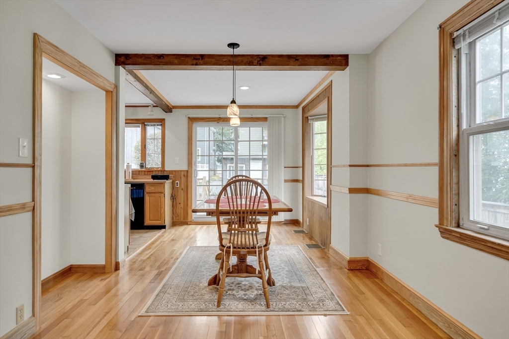 15 Sunset Road Cambridge, MA 02138 - Photo 7 of 26 a view of a livingroom with furniture wooden floor and windows
