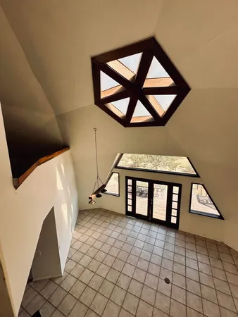 a view of an entryway with a bench