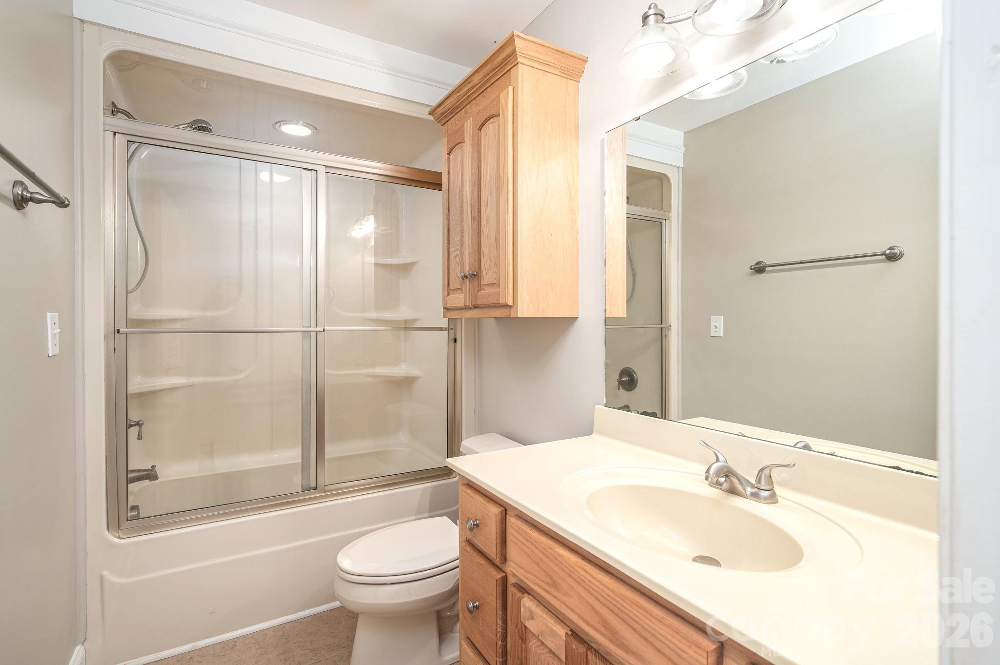 515 Highway 161 Clover, SC 29710 - Photo 18 of 30 a bathroom with a sink toilet and shower
