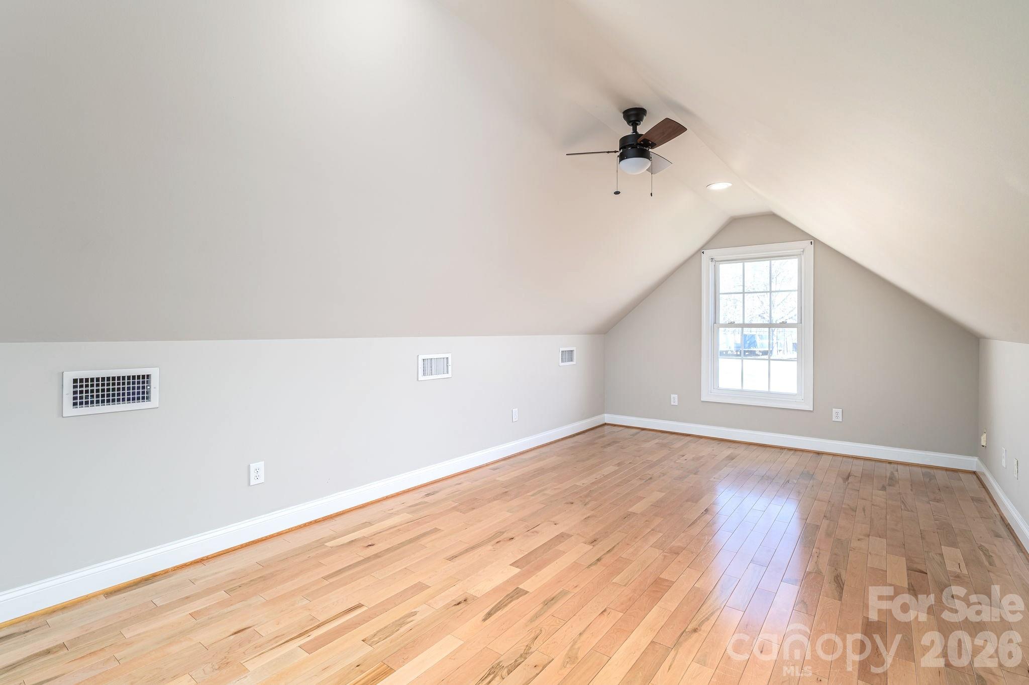 515 Highway 161 Clover, SC 29710 - Photo 20 of 30 a view of an empty room with wooden floor and a window