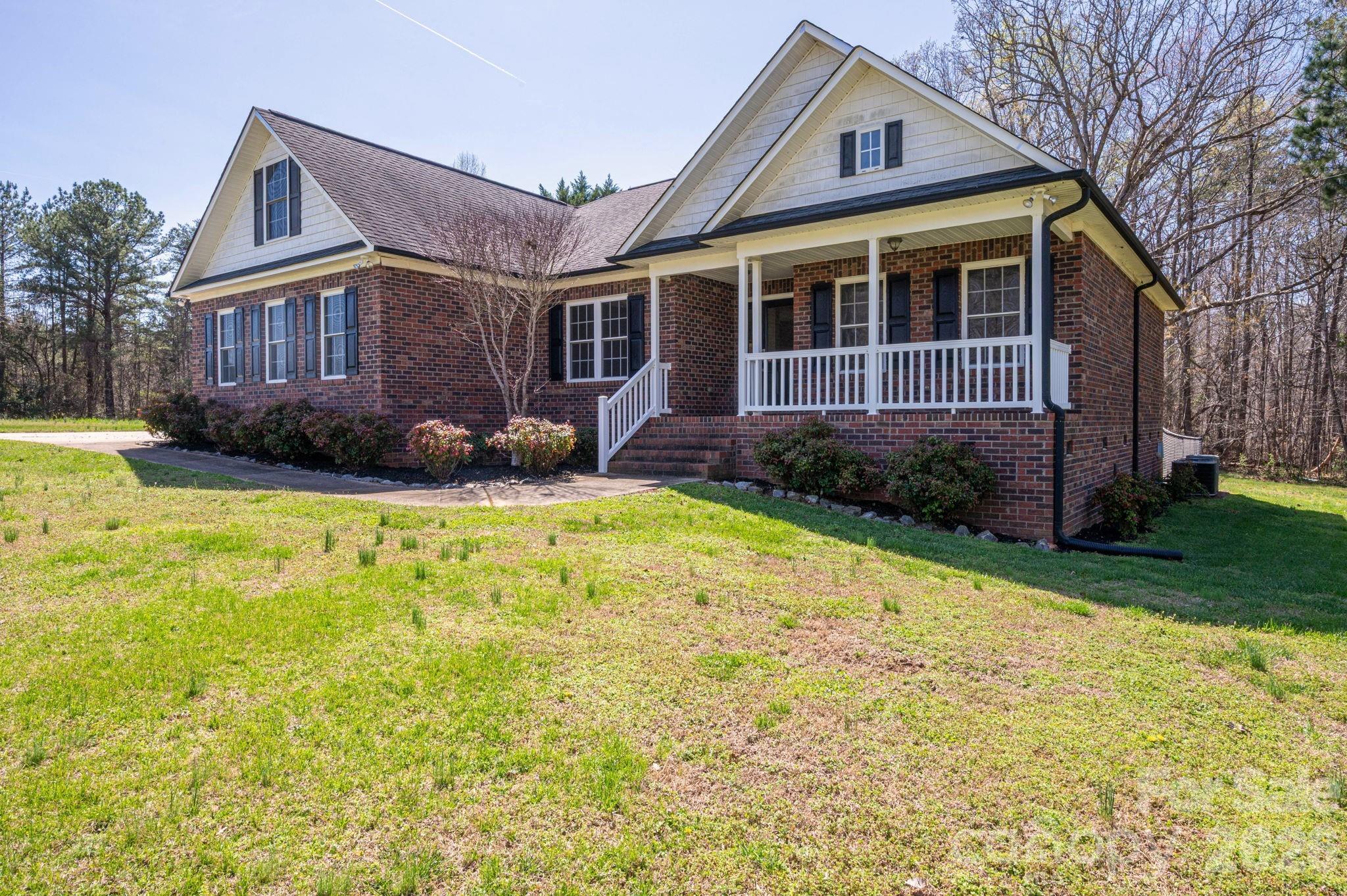 515 Highway 161 Clover, SC 29710 - Photo 3 of 30 a front view of a house with a yard