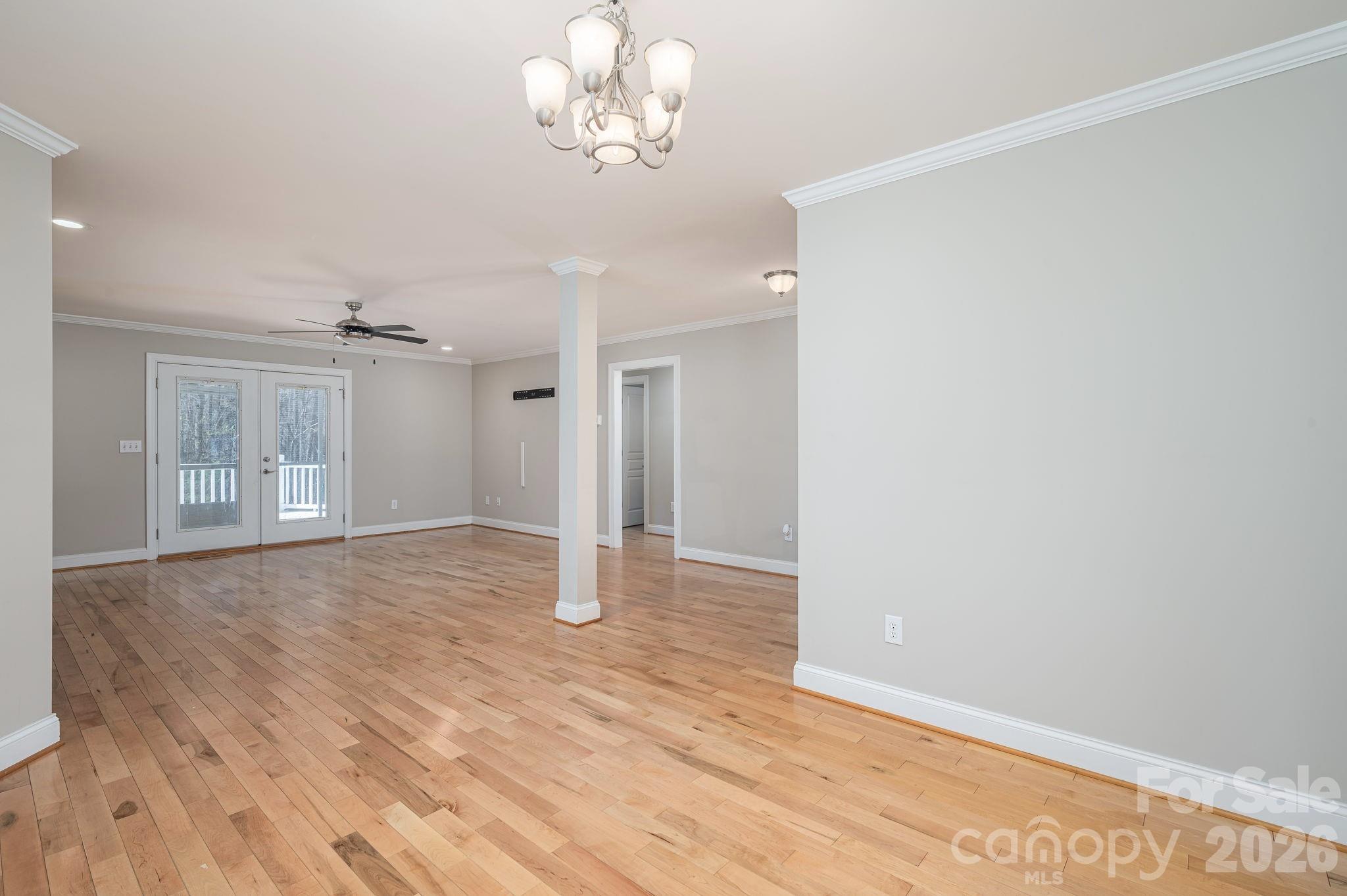 515 Highway 161 Clover, SC 29710 - Photo 4 of 30 wooden floor in an empty room with a window