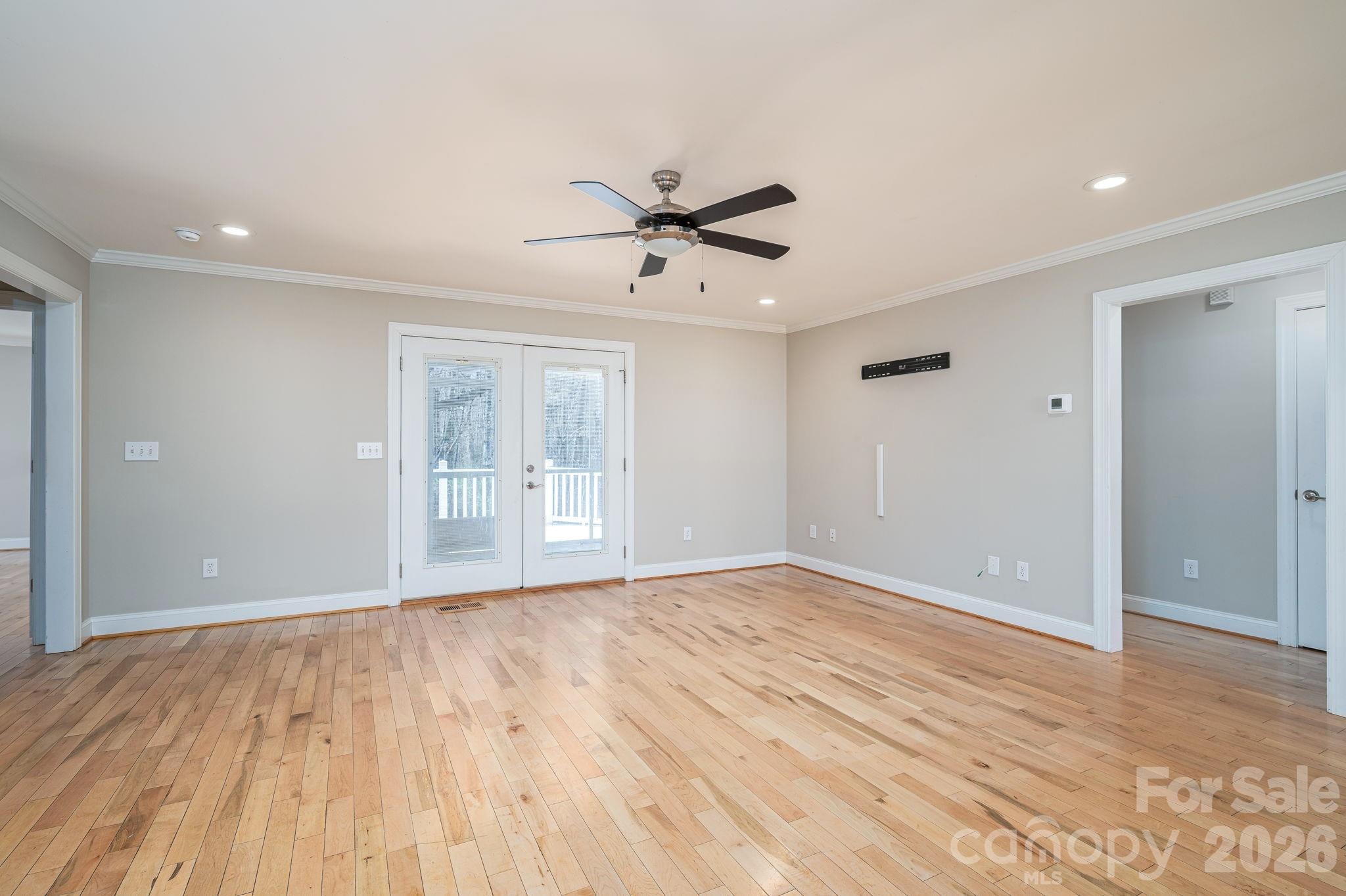 515 Highway 161 Clover, SC 29710 - Photo 6 of 30 a view of an empty room with a window and a kitchen