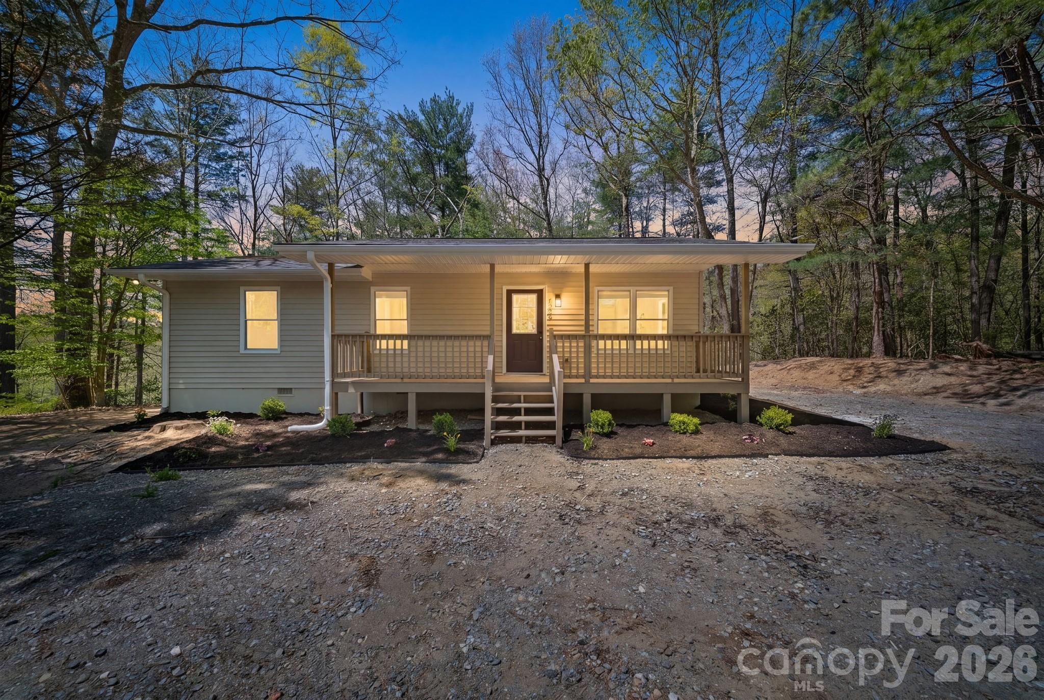 1263 See Off Mountain Road Brevard, NC 28712 - Photo 17 of 21 a view of a house with backyard and trees