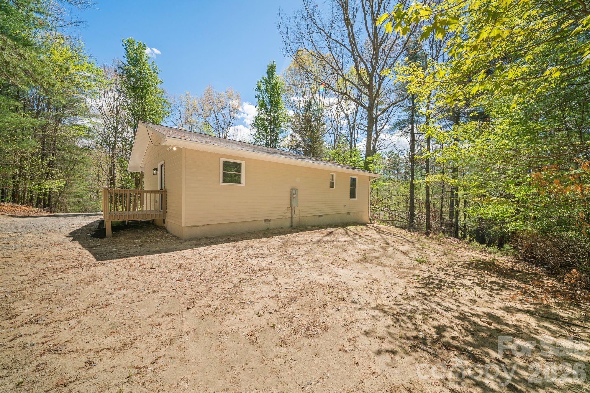 1263 See Off Mountain Road Brevard, NC 28712 - Photo 18 of 21 a view of a backyard of the house