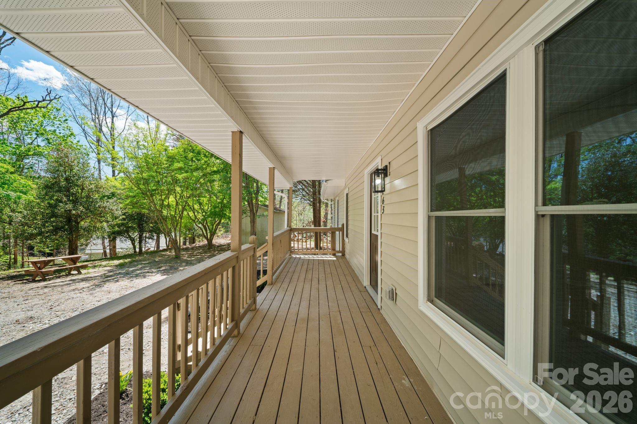 1263 See Off Mountain Road Brevard, NC 28712 - Photo 19 of 21 a view of a balcony with wooden floor