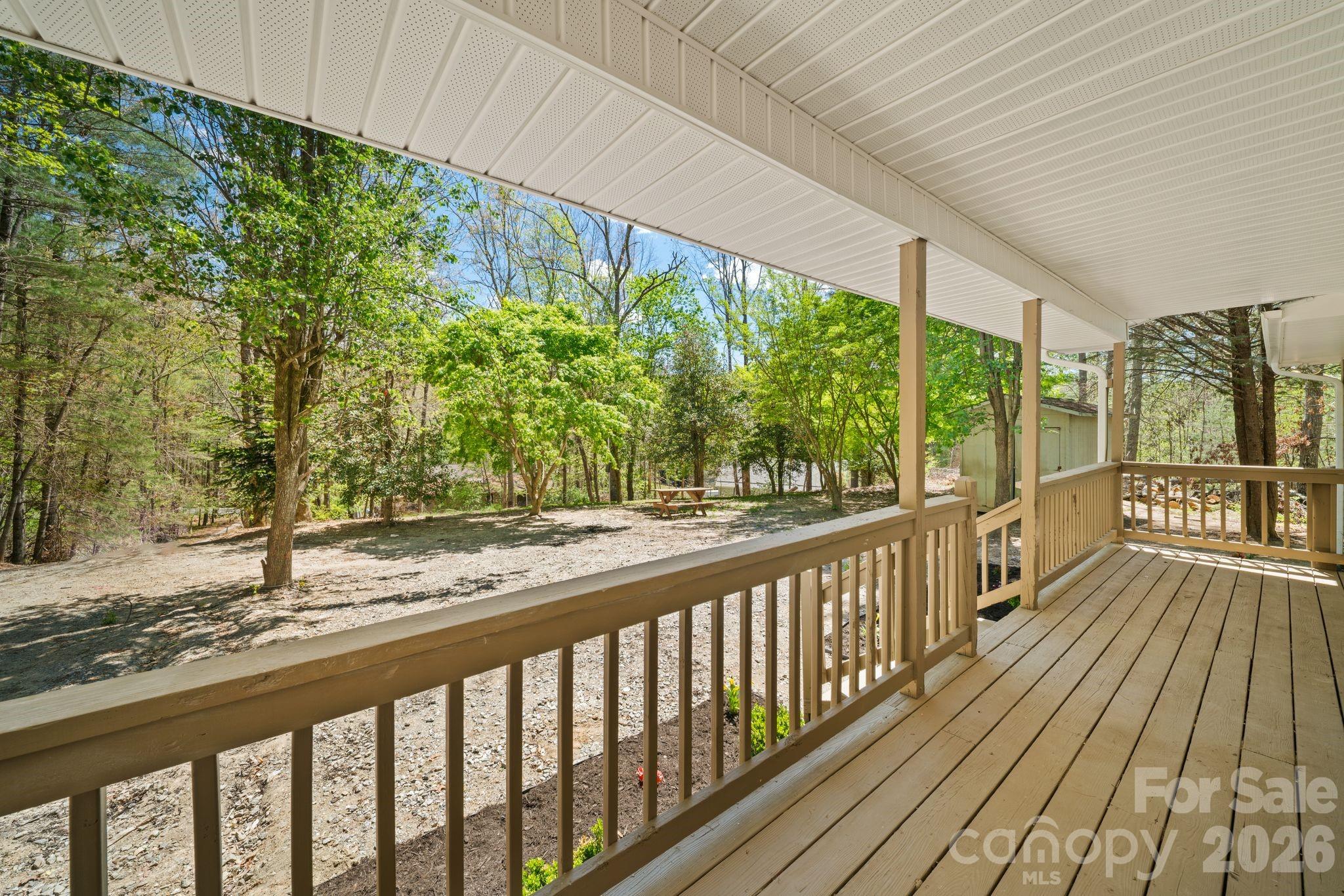 1263 See Off Mountain Road Brevard, NC 28712 - Photo 3 of 21 a view of balcony with wooden floor