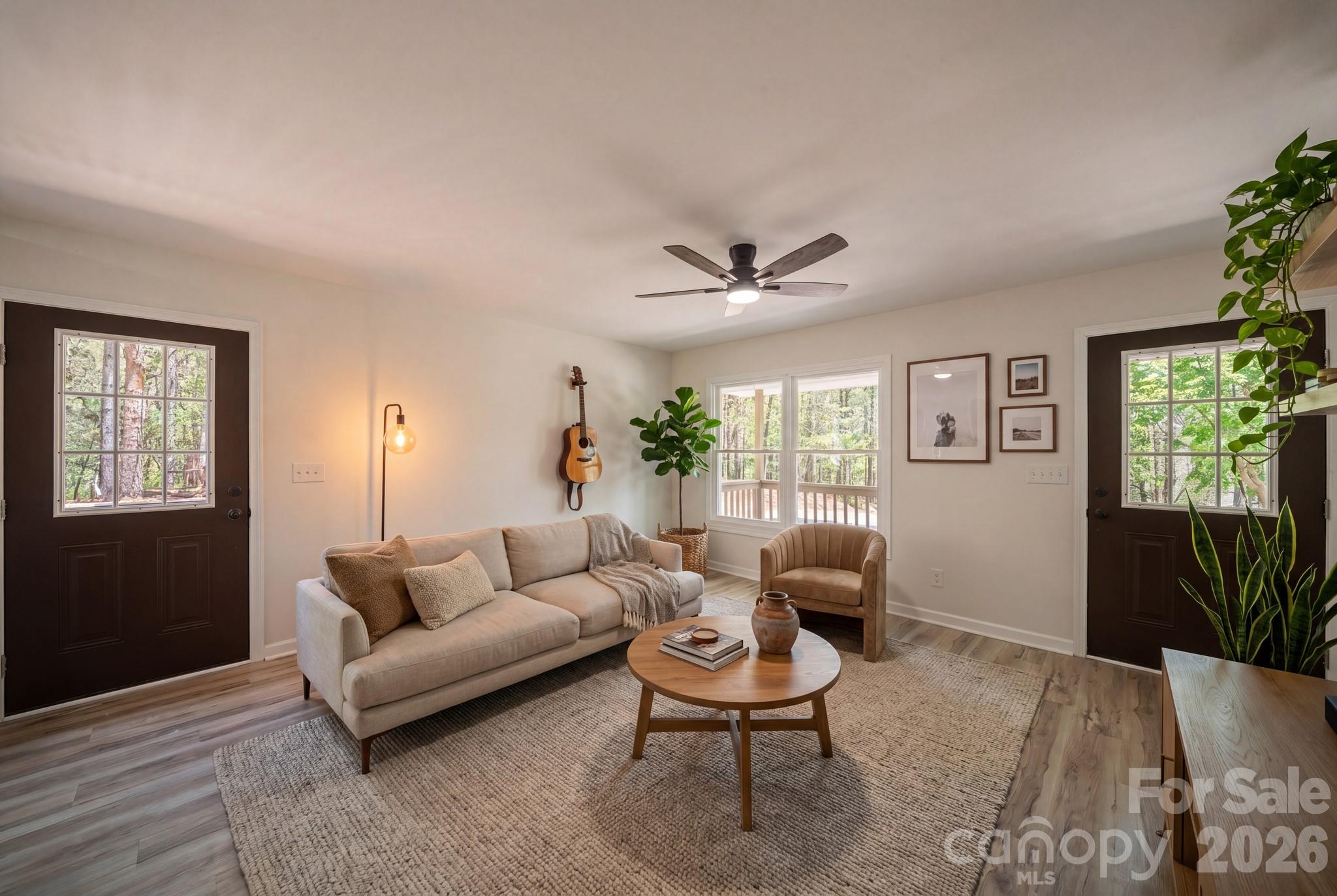 1263 See Off Mountain Road Brevard, NC 28712 - Photo 4 of 21 a living room with furniture and a large window