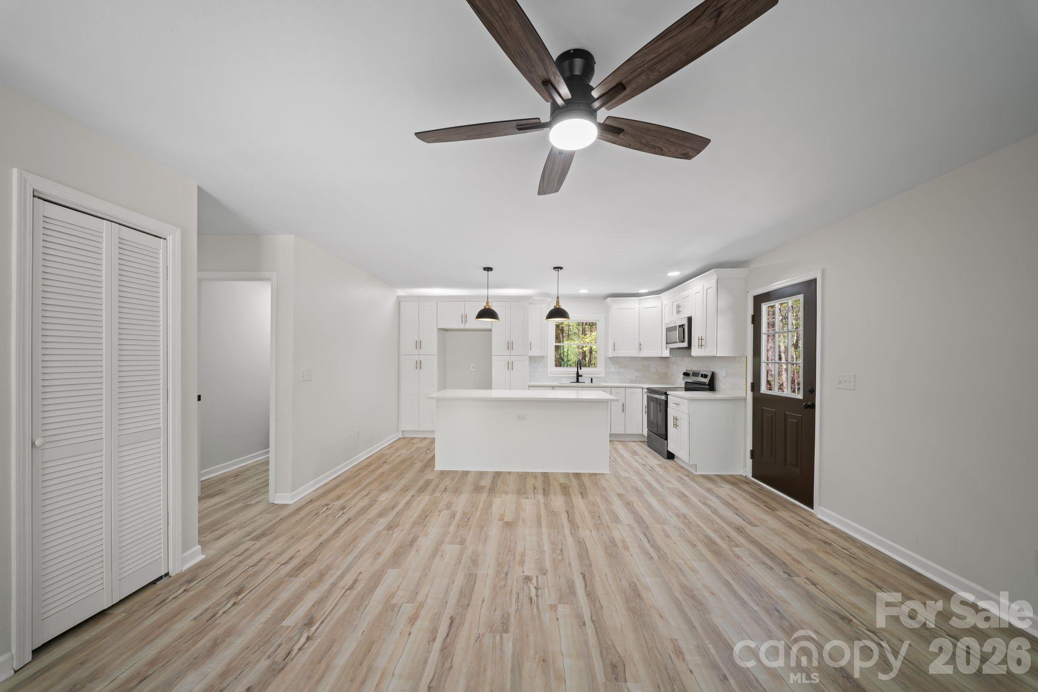 1263 See Off Mountain Road Brevard, NC 28712 - Photo 5 of 21 a view of cabinets and wooden floor