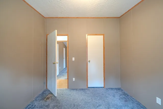 a close up of a wall with a shower