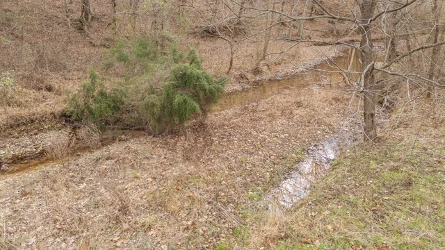 a view of building with trees in the background