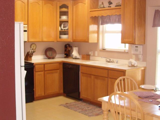 2510 Maple Grove Road Sunnyside, WA 98944 - Photo 5 of 9 a kitchen with a sink a stove and a window