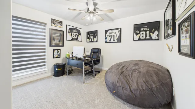 a room with furniture and a window