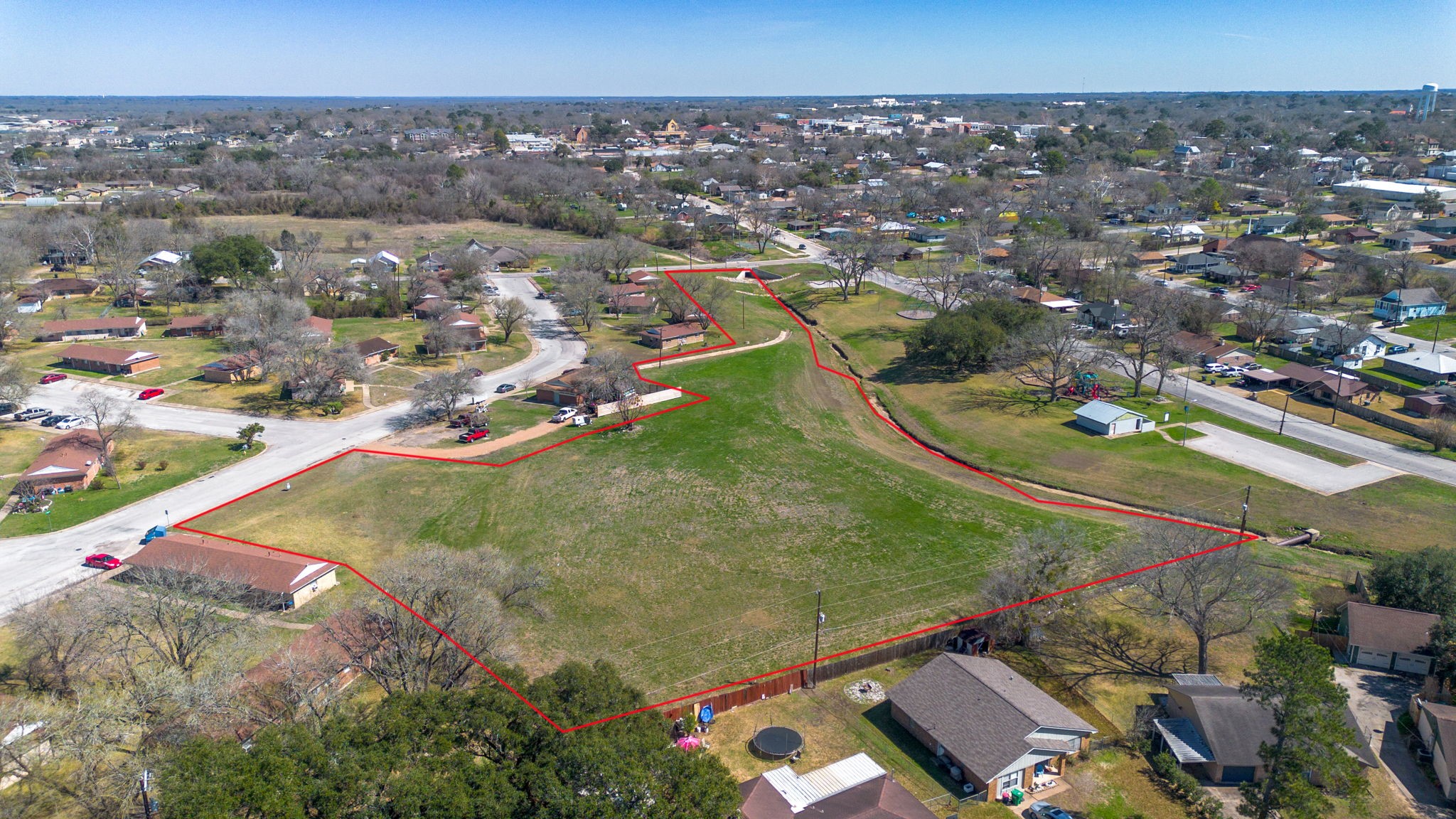 0 Pleasant View Avenue Brenham, TX 77833 - Photo 8 of 9 an aerial view of a residential houses with outdoor space and a lake view