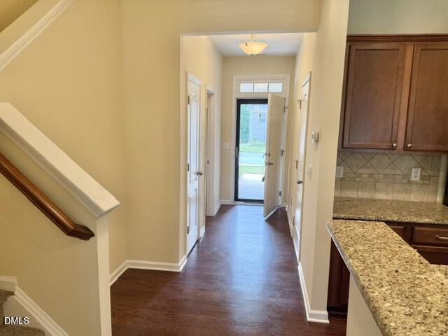 8227 Primanti Boulevard Raleigh, NC 27612 - Photo 4 of 25 a view of a hallway with wooden floor