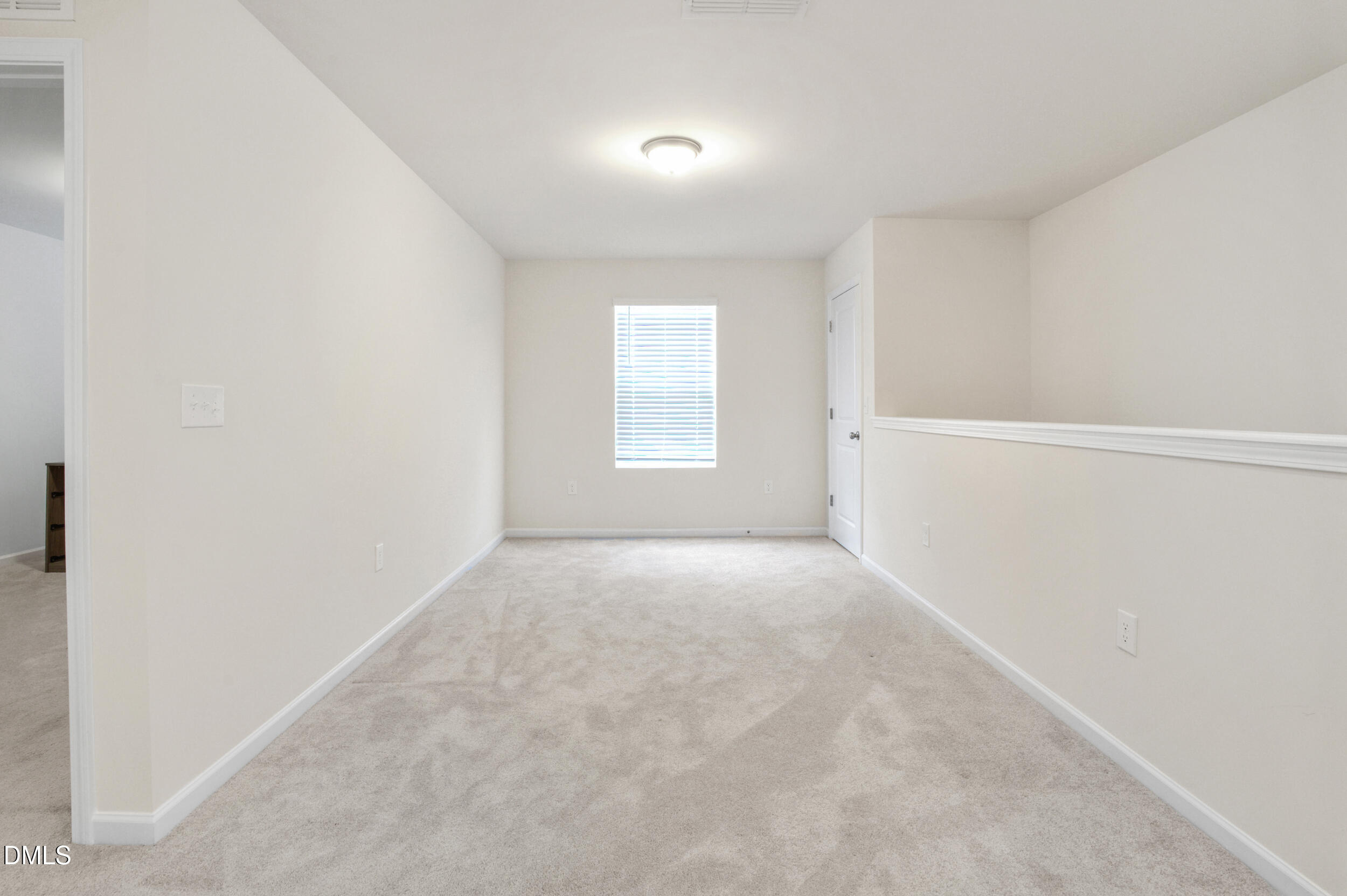 1416 Heron Pond Street Raleigh, NC 27604 - Photo 23 of 25 an empty room with windows